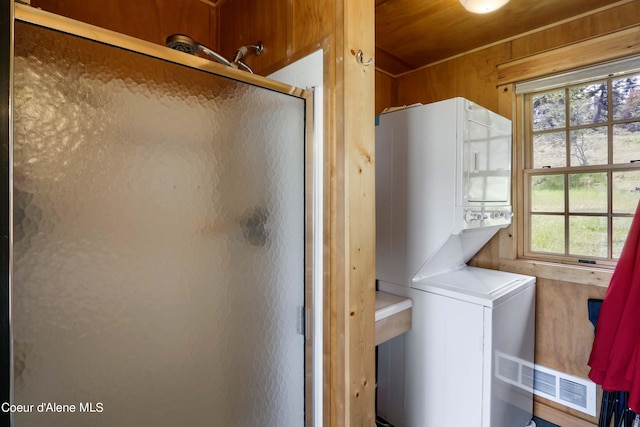 1930 Warren Island Shrs, Hope, ID 83836 - clothes washing area with visible vents, stacked washer and dryer, and laundry area