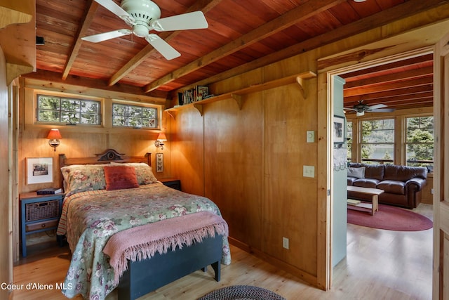 1930 Warren Island Shrs, Hope, ID 83836 - bedroom with wooden walls, multiple windows, wood ceiling, and beamed ceiling