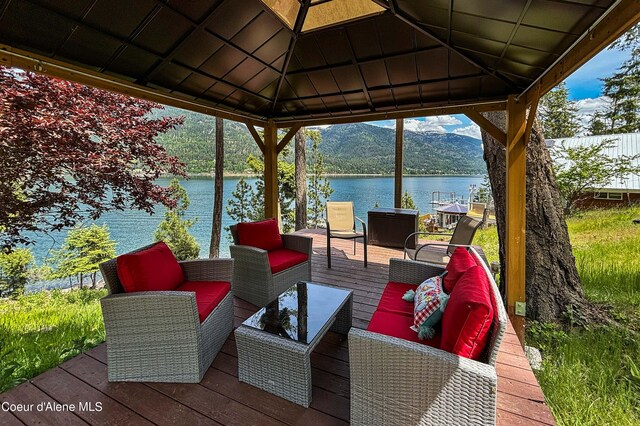 1930 Warren Island Shrs, Hope, ID 83836 - deck featuring a gazebo, outdoor lounge area, and a water and mountain view