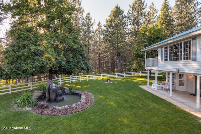 5718 E Sleepy Ln, Coeur Dalene, ID 83814 - fenced backyard with a patio area and a balcony