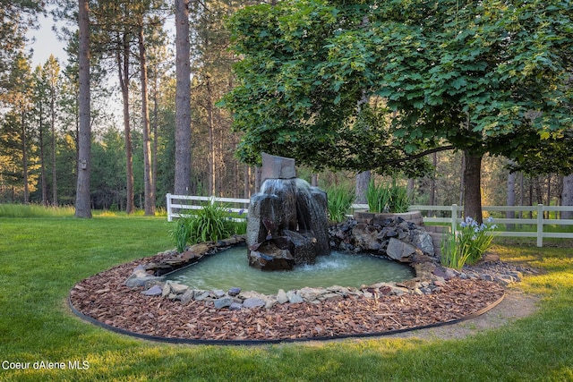 5718 E Sleepy Ln, Coeur Dalene, ID 83814 - view of yard with a small pond