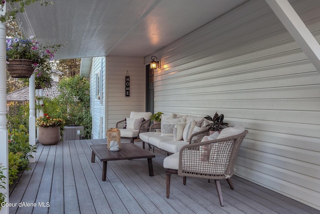 5718 E Sleepy Ln, Coeur Dalene, ID 83814 - wooden deck with an outdoor hangout area