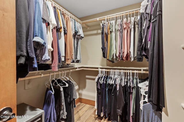 5718 E Sleepy Ln, Coeur Dalene, ID 83814 - walk in closet featuring wood finished floors