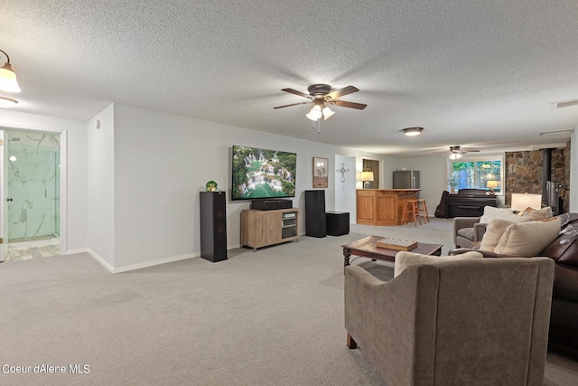 5718 E Sleepy Ln, Coeur Dalene, ID 83814 - carpeted living room featuring ceiling fan and a textured ceiling