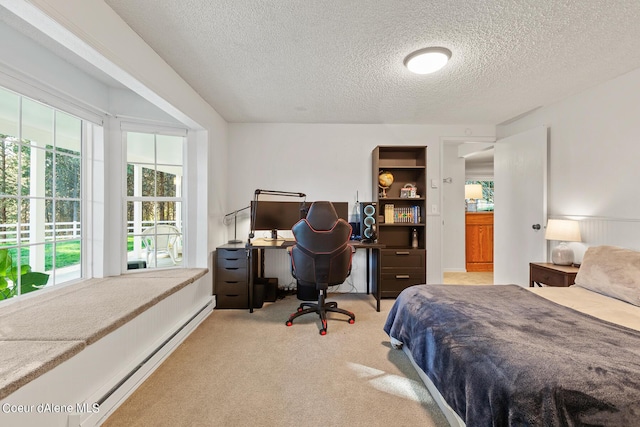 5718 E Sleepy Ln, Coeur Dalene, ID 83814 - bedroom featuring carpet, a textured ceiling, multiple windows, and an office area