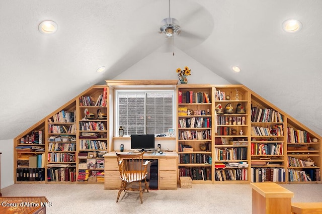 home office with ceiling fan, carpet, and vaulted ceiling