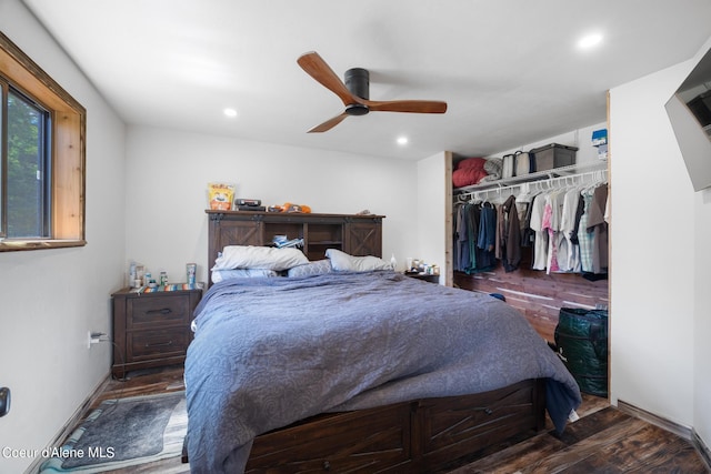 bedroom featuring recessed lighting, a closet, ceiling fan, wood finished floors, and baseboards