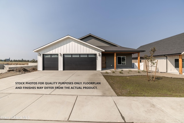 modern farmhouse with a garage and a front yard