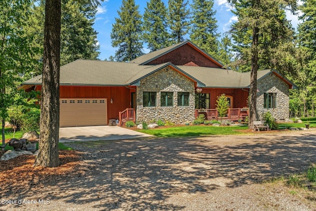 single story home with a garage and a porch