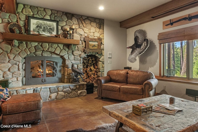 living room with recessed lighting, a fireplace, concrete flooring, and beam ceiling