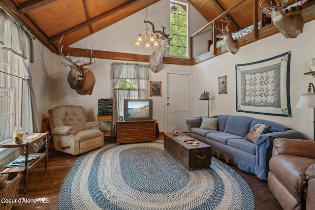 living room with wood-type flooring, high vaulted ceiling, a chandelier, and beamed ceiling