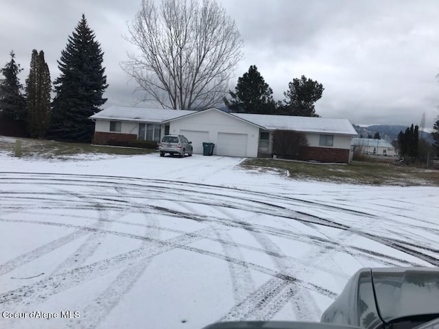 500 W Twilight Ct, Coeur Dalene, ID 83814 - ranch-style home featuring a garage