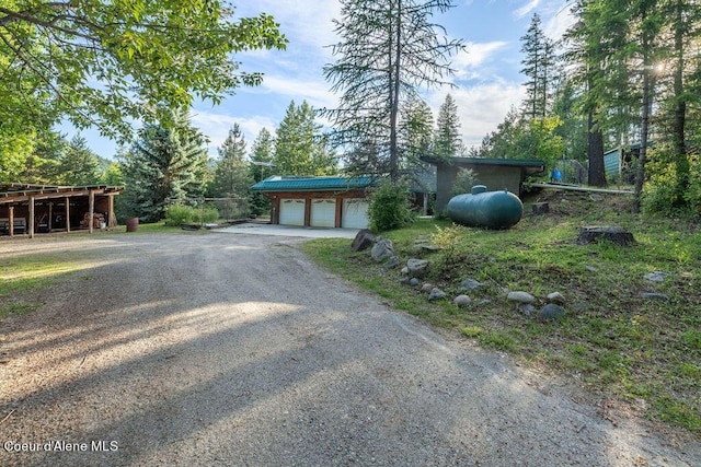 view of yard featuring a garage