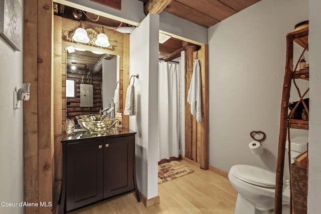 bathroom featuring wood ceiling, vanity, a shower with curtain, toilet, and hardwood / wood-style flooring