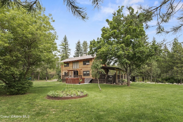 view of yard with a deck