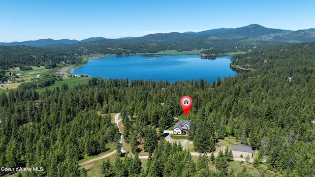 17536 W Julia Dr, Hauser, ID 83854 - bird's eye view of a heavily wooded area and a water and mountain view