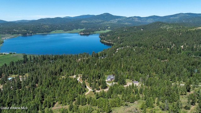 17536 W Julia Dr, Hauser, ID 83854 - bird's eye view of a heavily wooded area and a water and mountain view