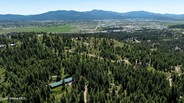 17536 W Julia Dr, Hauser, ID 83854 - aerial view of property and surrounding area with a mountain backdrop