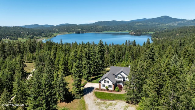 17536 W Julia Dr, Hauser, ID 83854 - view from above of property featuring a heavily wooded area and a water and mountain view