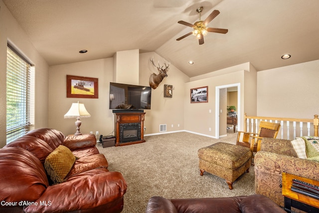 17536 W Julia Dr, Hauser, ID 83854 - living area featuring a ceiling fan, carpet floors, lofted ceiling, a glass covered fireplace, and recessed lighting