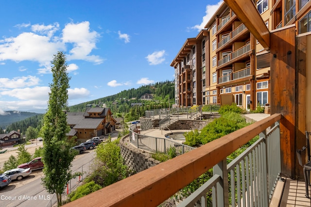 balcony featuring a mountain view