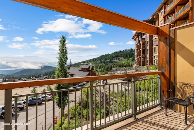 balcony featuring a mountain view