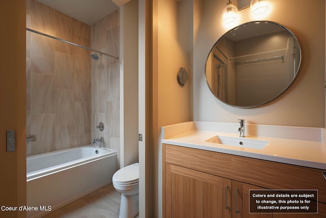 bathroom featuring vanity, tile patterned floors, toilet, and shower / washtub combination