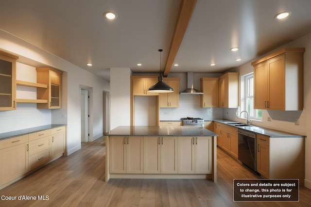 kitchen with a sink, tasteful backsplash, wood finished floors, appliances with stainless steel finishes, and wall chimney exhaust hood