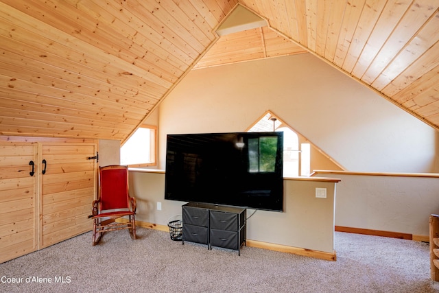 sitting room featuring carpet flooring, wooden ceiling, and lofted ceiling