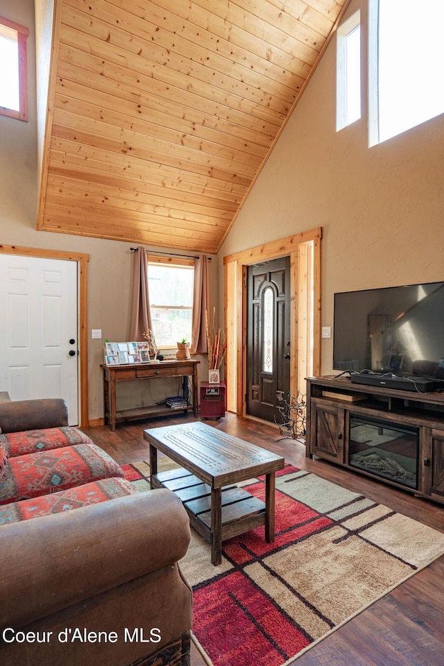living room featuring wood ceiling, wood finished floors, and high vaulted ceiling