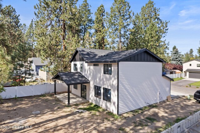 view of property exterior with a garage