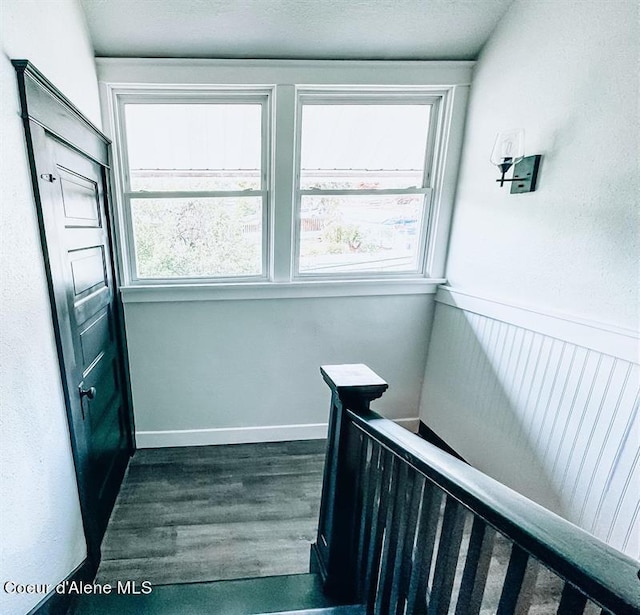 staircase featuring hardwood / wood-style floors