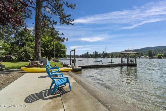 dock area featuring a water view