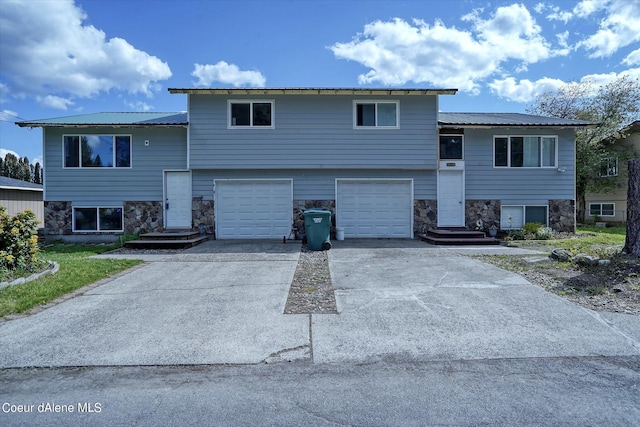 split level home with a garage