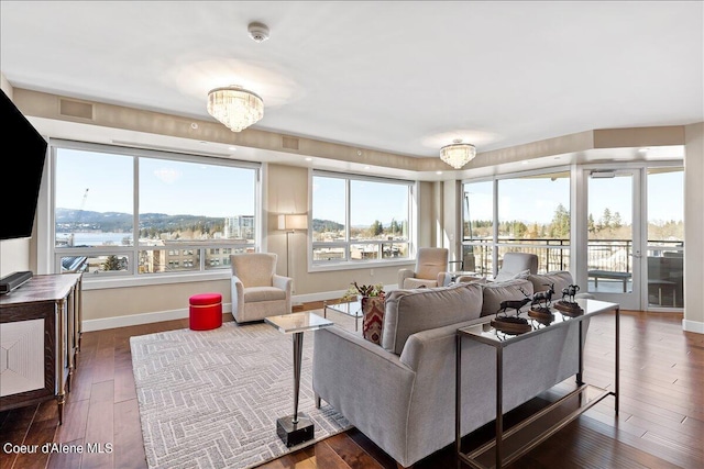 living room featuring dark hardwood / wood-style flooring