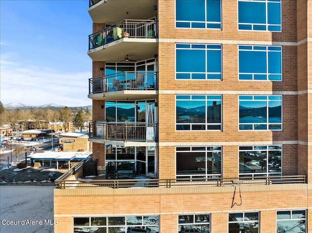 view of building exterior with a mountain view