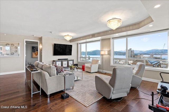 living room with dark hardwood / wood-style floors