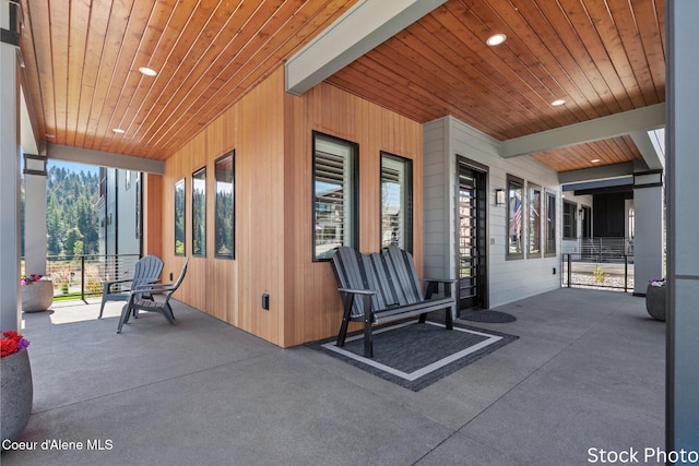 view of patio featuring a porch