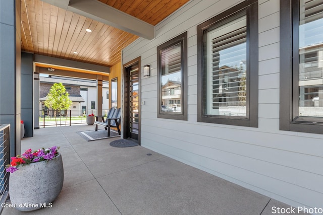 view of patio featuring a porch