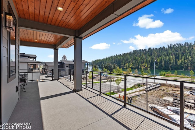 balcony with a forest view