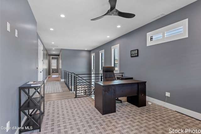 office space featuring baseboards, visible vents, carpet flooring, and recessed lighting