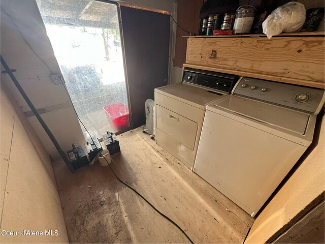 laundry room featuring laundry area and separate washer and dryer