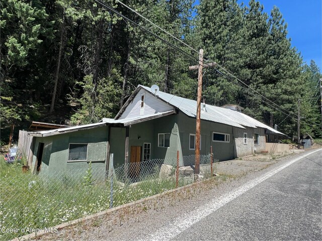 view of home's exterior featuring metal roof