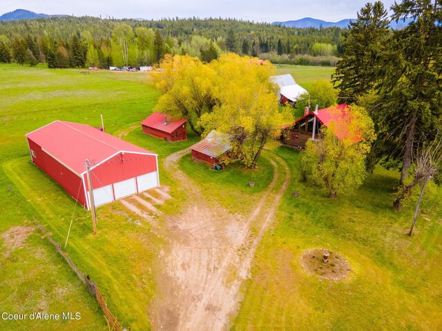 drone / aerial view featuring a mountain view