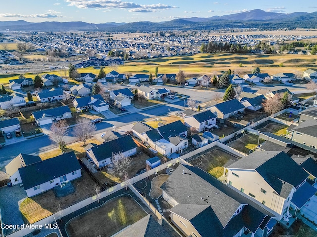 bird's eye view featuring a residential view and a mountain view