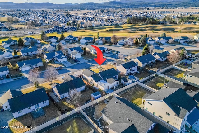 bird's eye view featuring a mountain view and a residential view