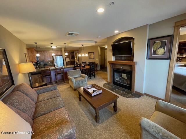 110 Morning Star Dr Unit 237, Kellogg, ID 83837 - carpeted living area with visible vents, recessed lighting, and baseboards