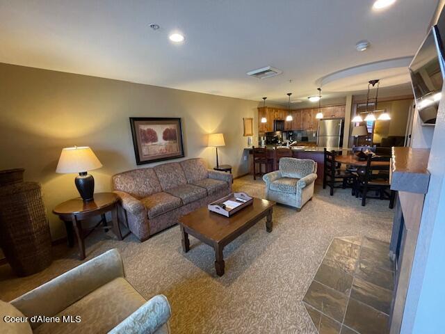 living room featuring carpet