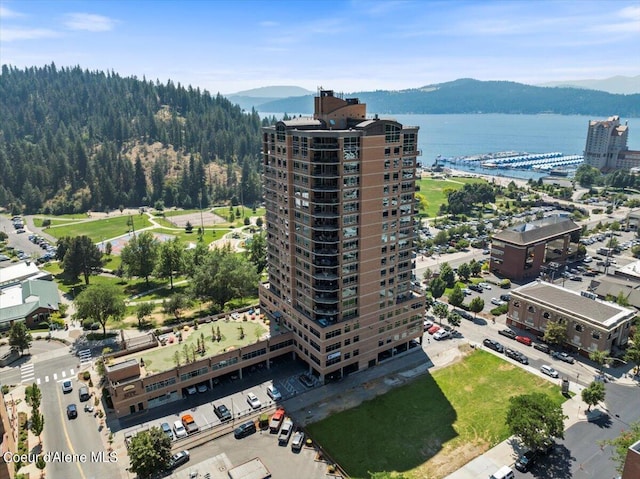 bird's eye view featuring a city view and a water and mountain view