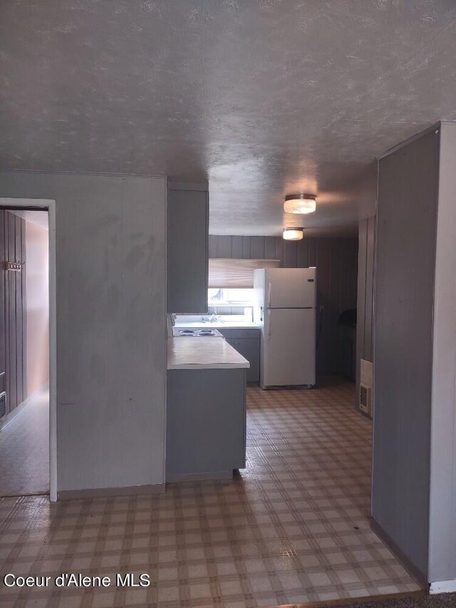 kitchen with white refrigerator